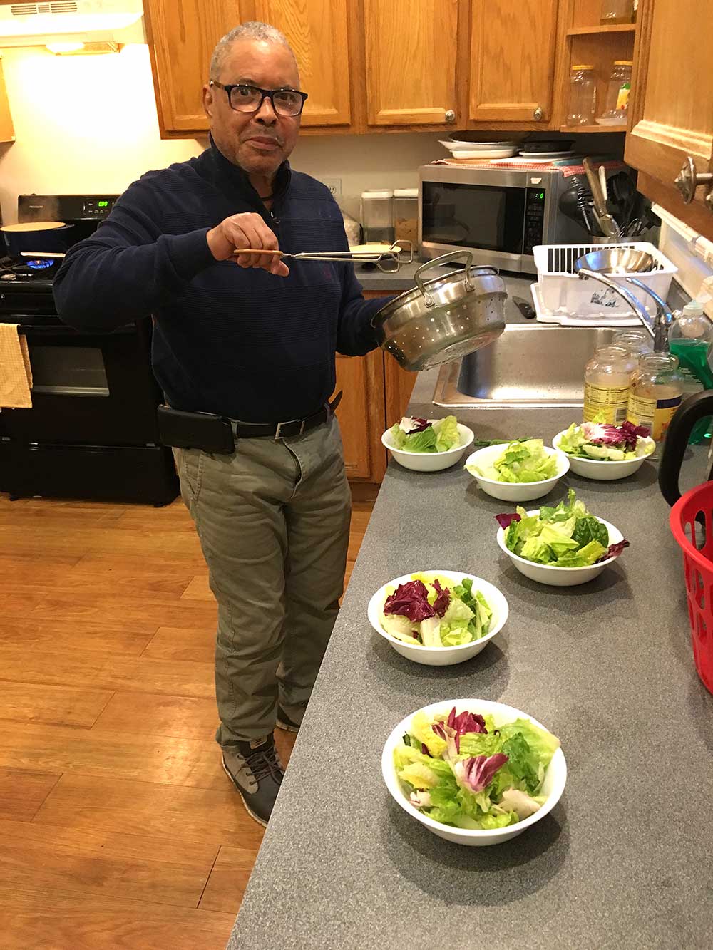 Photo of man in kitchen